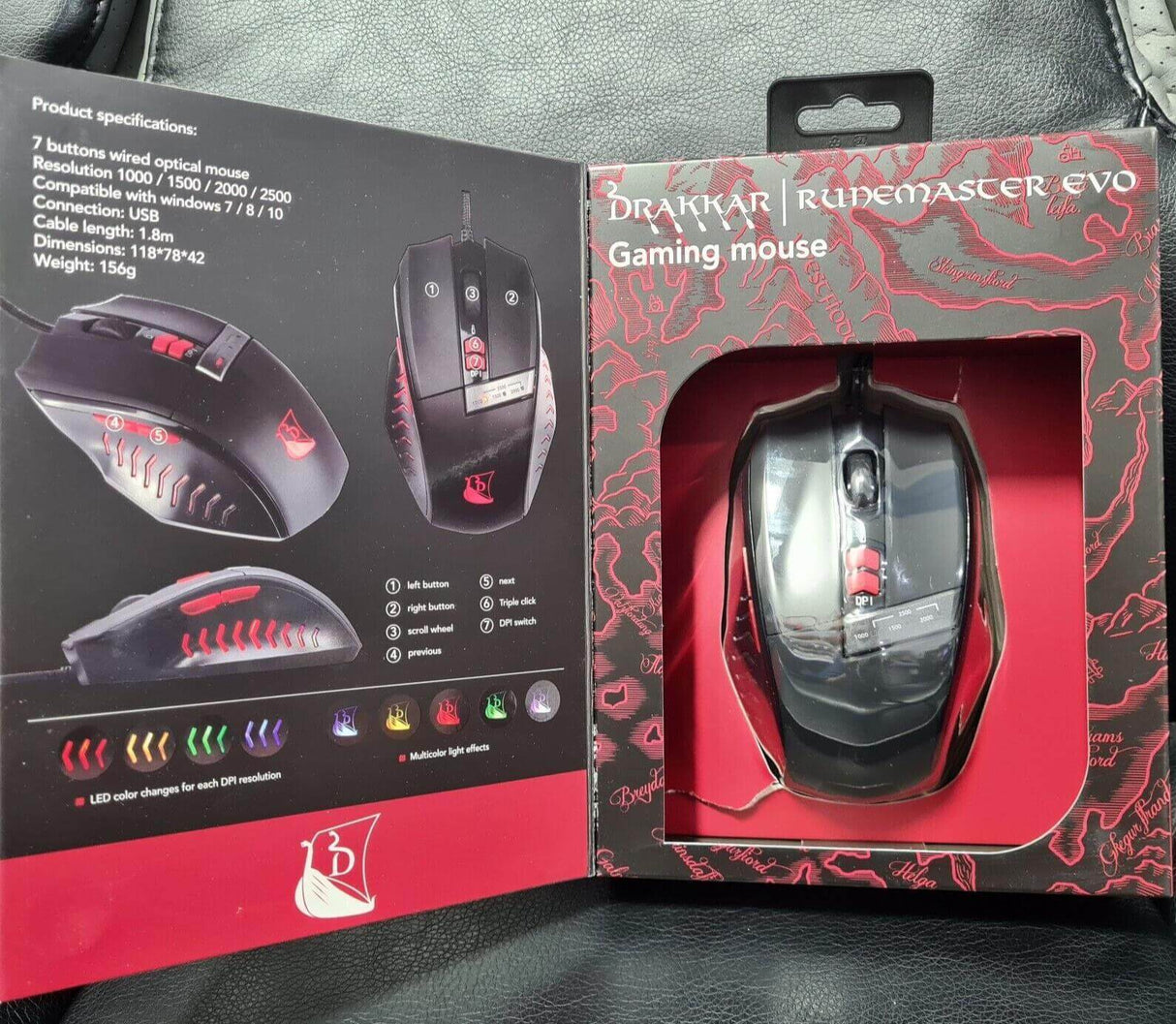 Konix Drakkar Runemaster Evo gaming mouse in packaging, showcasing LED color change and 7 buttons for optimal gaming performance.