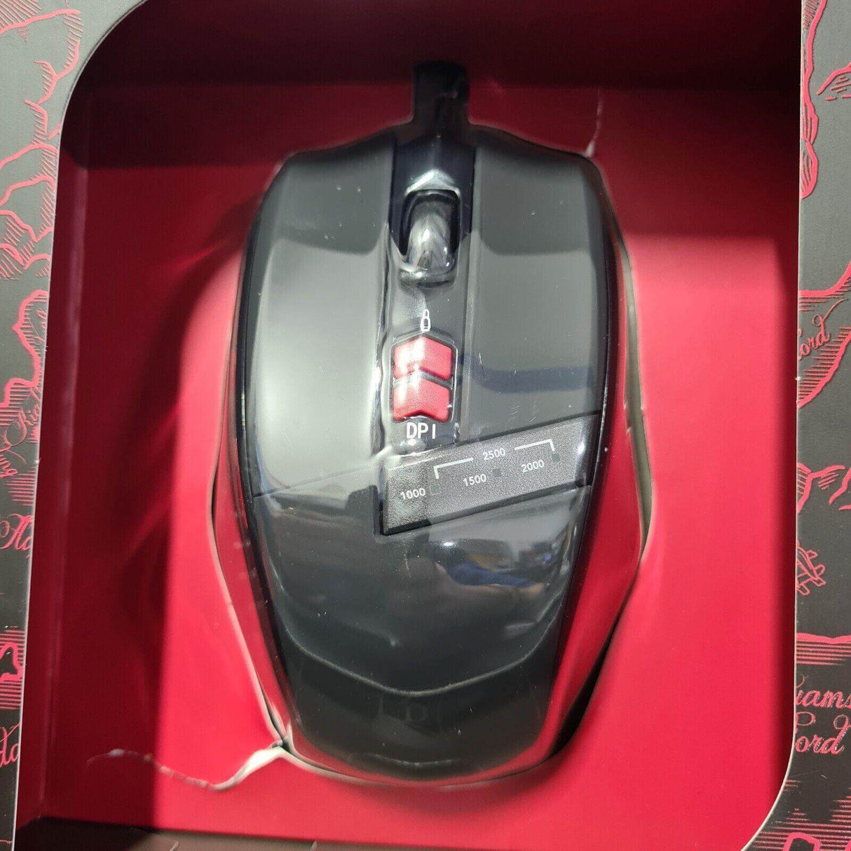 Konix Drakkar Runemaster Evo PC gaming mouse in red packaging, featuring DPI adjustment and sleek black design.