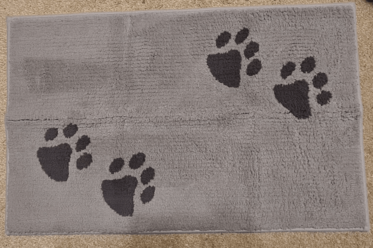 PURRUGS grey indoor door mat with black paw prints, 60 x 90 cm, perfect for trapping dirt and spills.