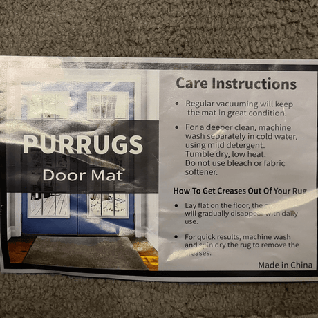 Care instructions for PURRUGS door mat detailing cleaning and maintenance tips.